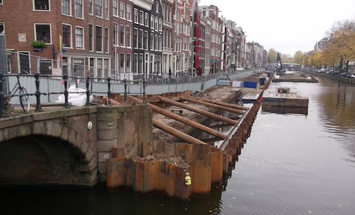 repairing an amsterdam canal wall.png